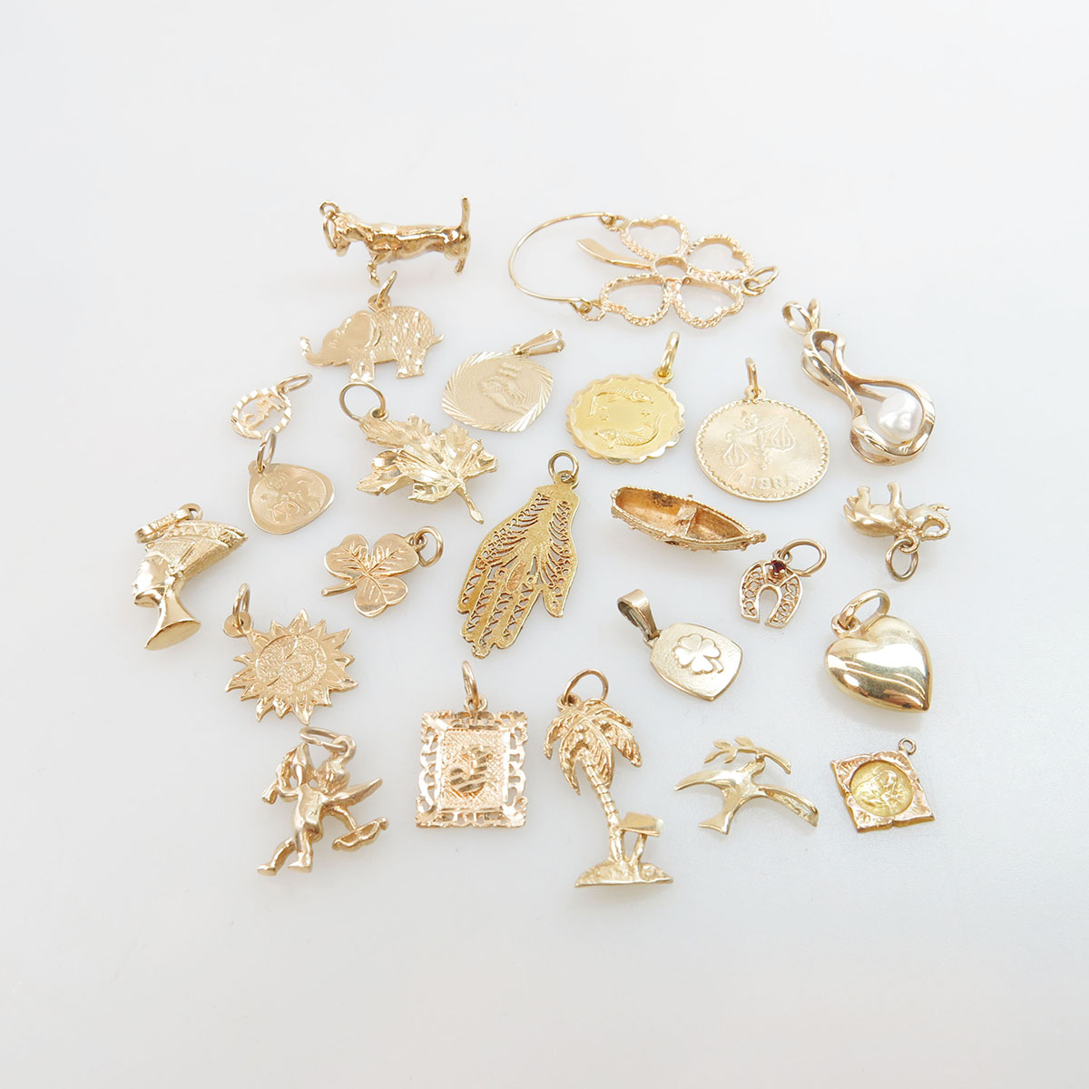 24 Various Gold Charms And Pendants