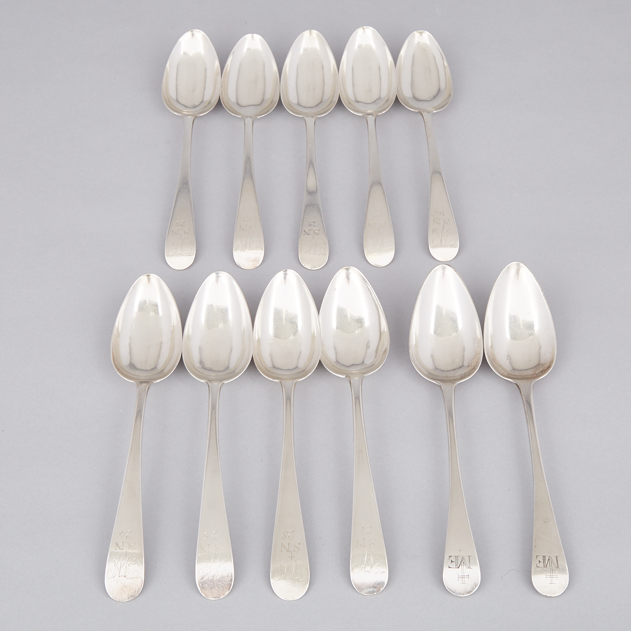 Eleven Canadian Silver Old English Pattern Table Spoons, Laurent Amiot, Quebec City, Que., c.1800