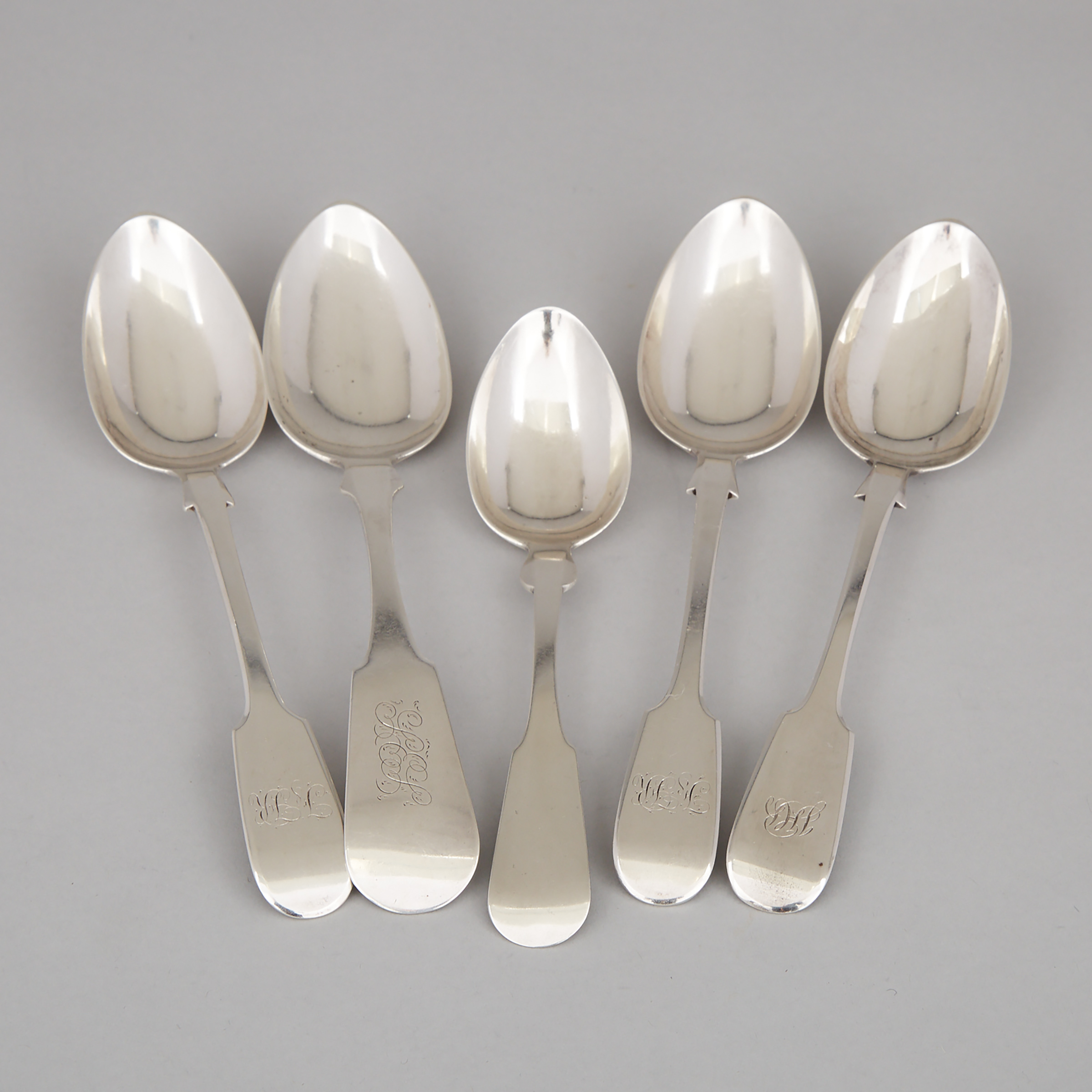 Four Canadian Silver Table Spoons and a Dessert Spoon, Savage, Lyman & Co., Montreal, Que. (3), William Norris Venning (1) and Albert & John Hay (1), Saint John, N.B., second half of the 19th century