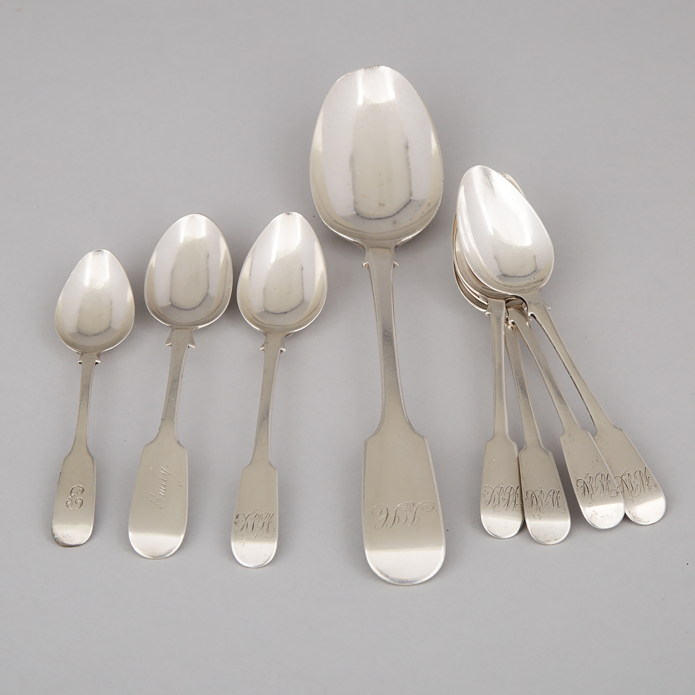 Canadian Silver Fiddle Pattern Table Spoon, Richard Kestell Oliver, Toronto, and Seven Tea Spoons, Nelson Walker (5), Hendery and Leslie for Canadian Mfg. Co., (1), A.S. unidentified (1), Montreal, Que., 19th century