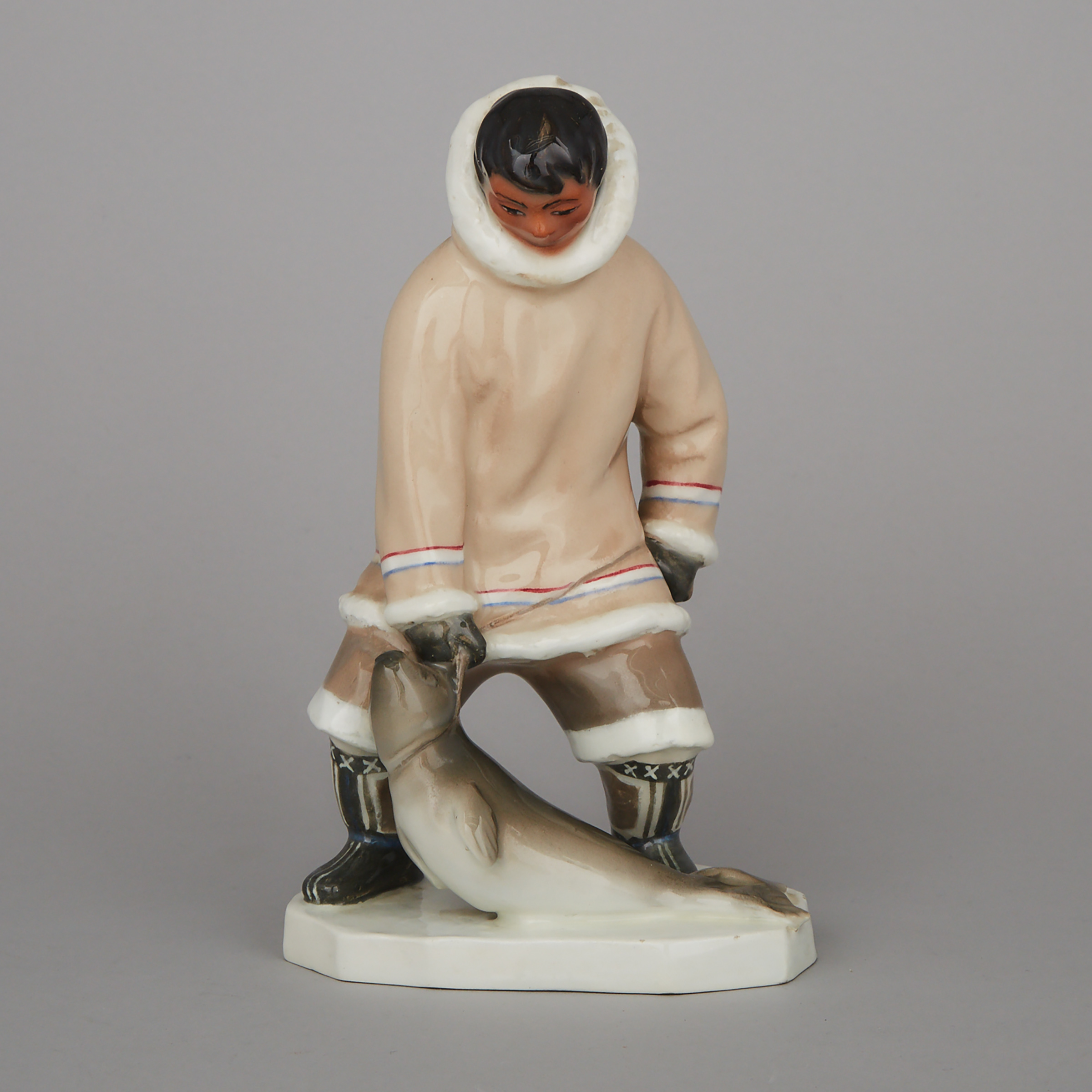 Leo Mol Porcelain Figure of an Inuk Hunter with Seal, 1953