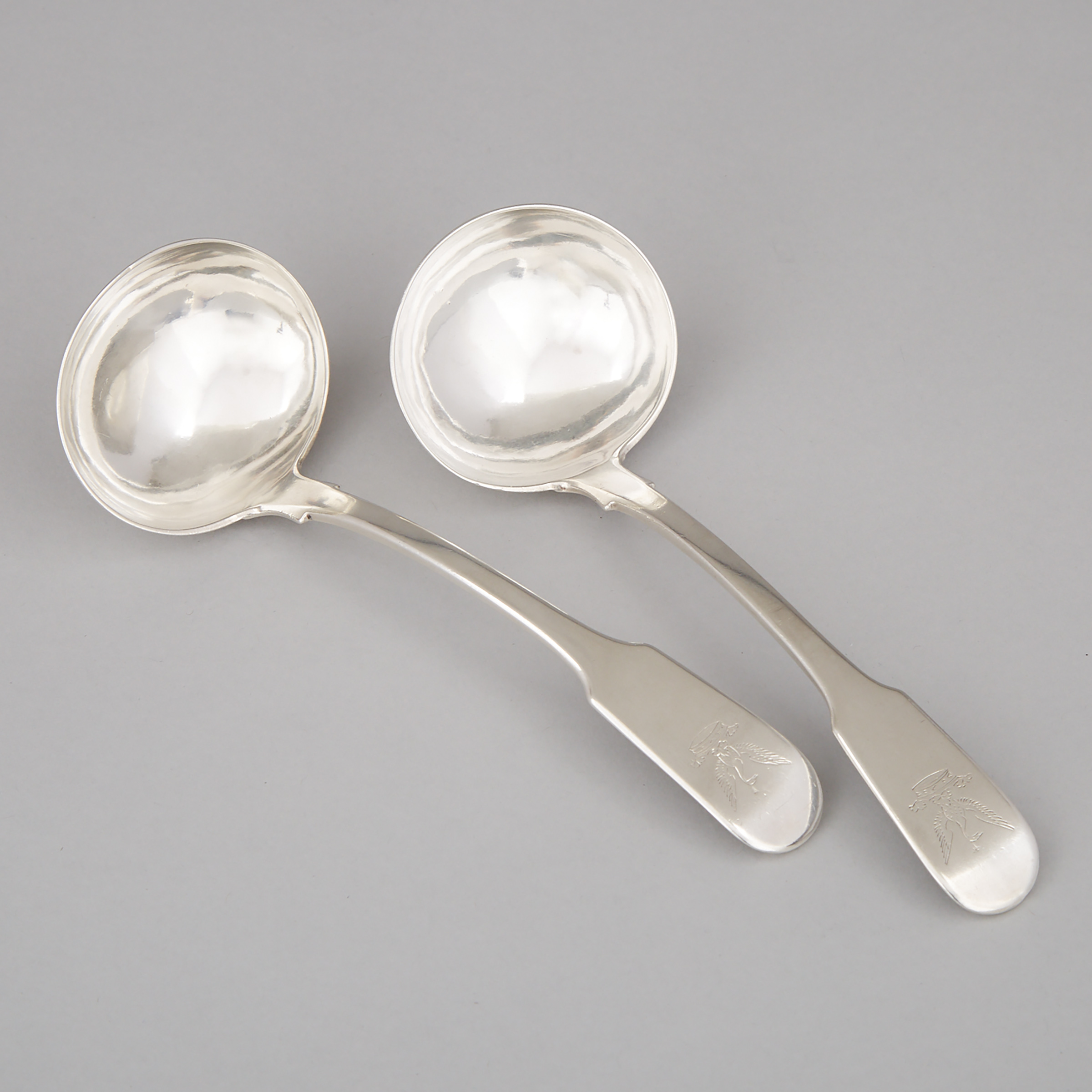 Pair of Canadian or Colonial Silver Sauce Ladles, mid-19th century 