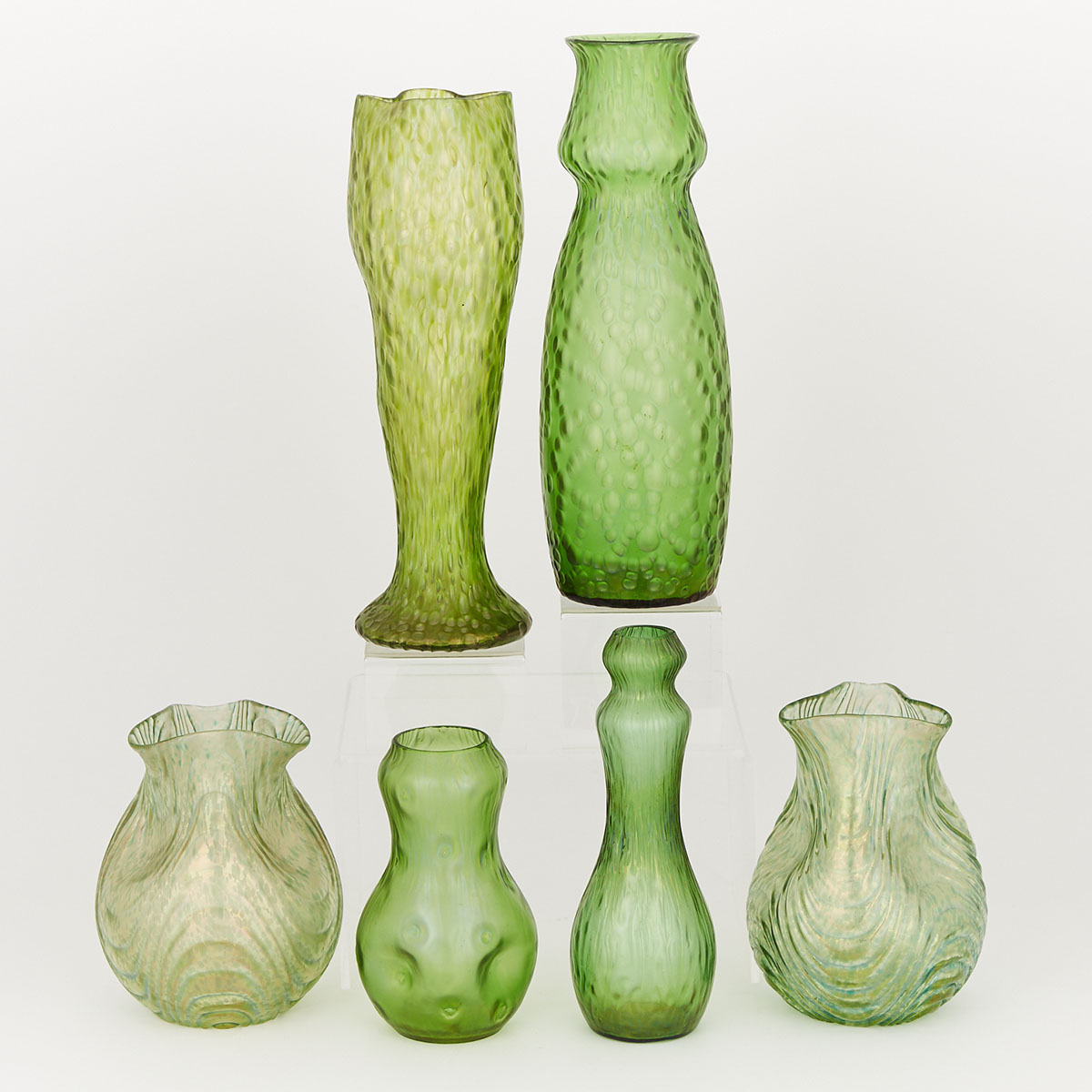 Six Bohemian Iridescent Green Glass Vases, early 20th century