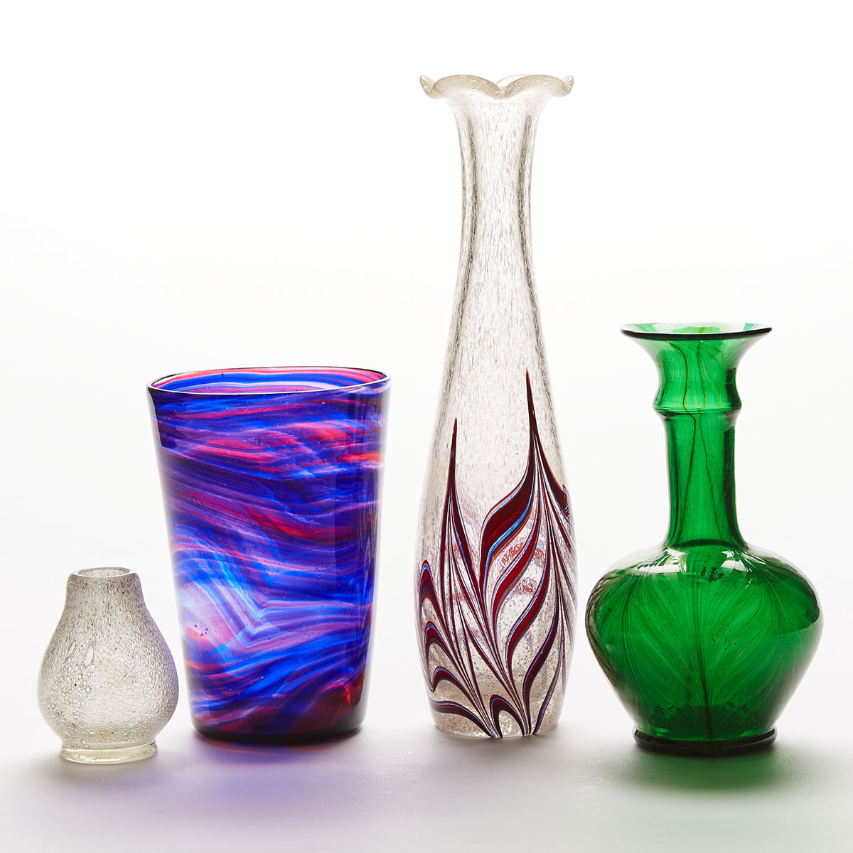 Four Various Coloured and Internally Decorated Glass Vases, probably Murano, mid-20th century