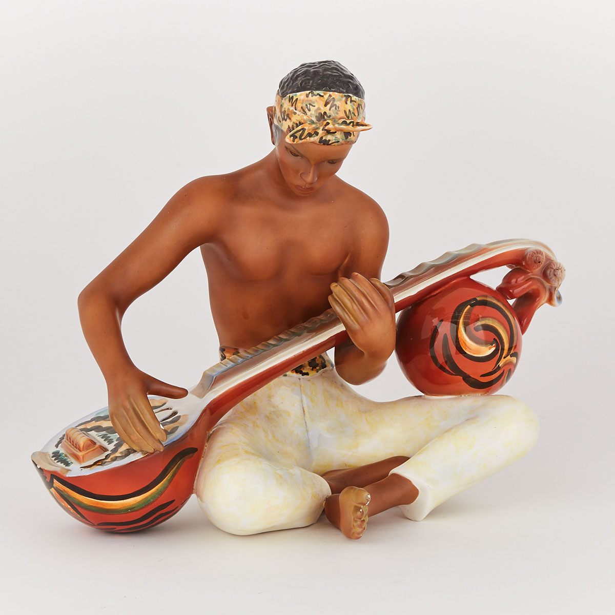 Le Bertetti Figure of a Seated Sitar Player, mid-20th century