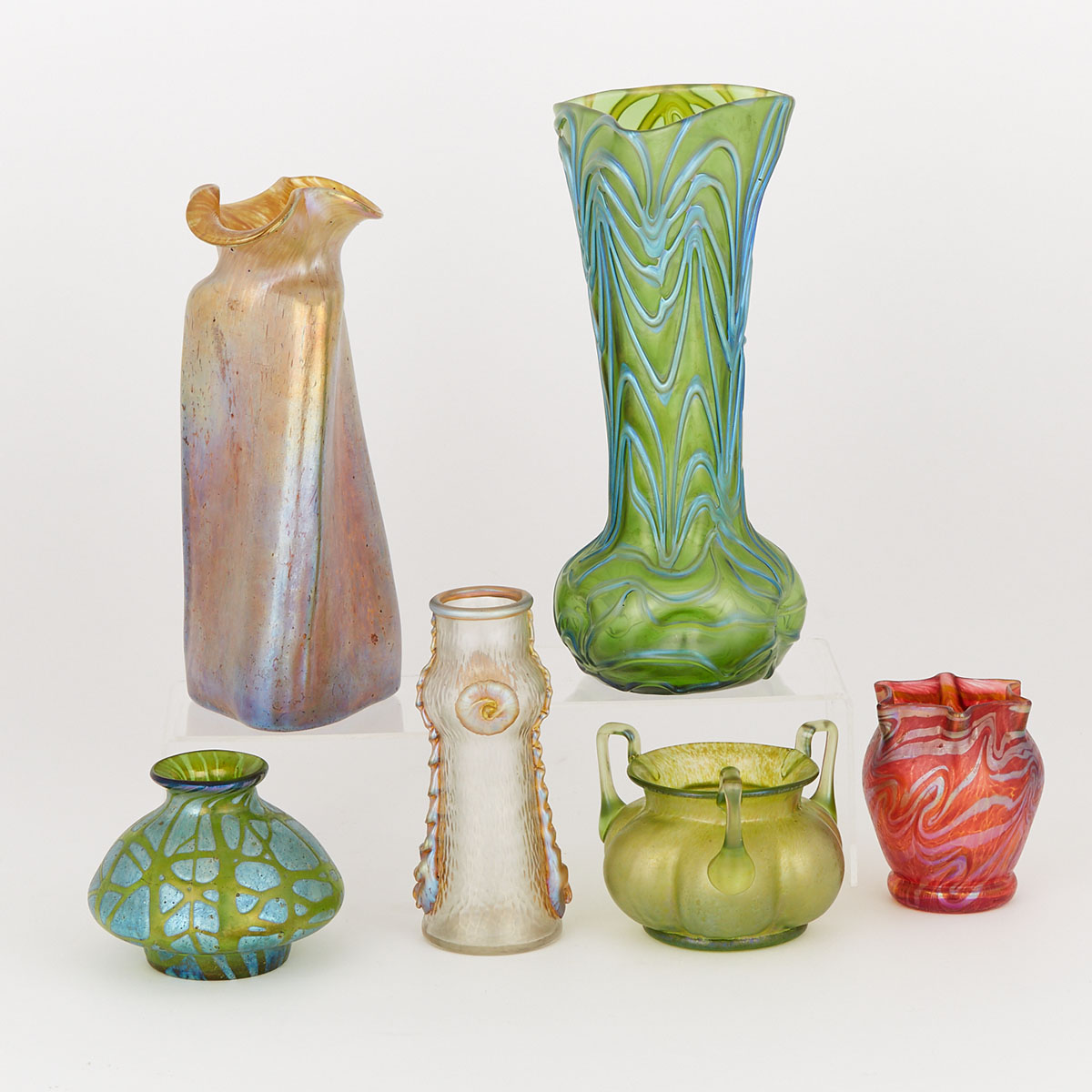 Six Bohemian Iridescent Coloured Glass Vases, early 20th century