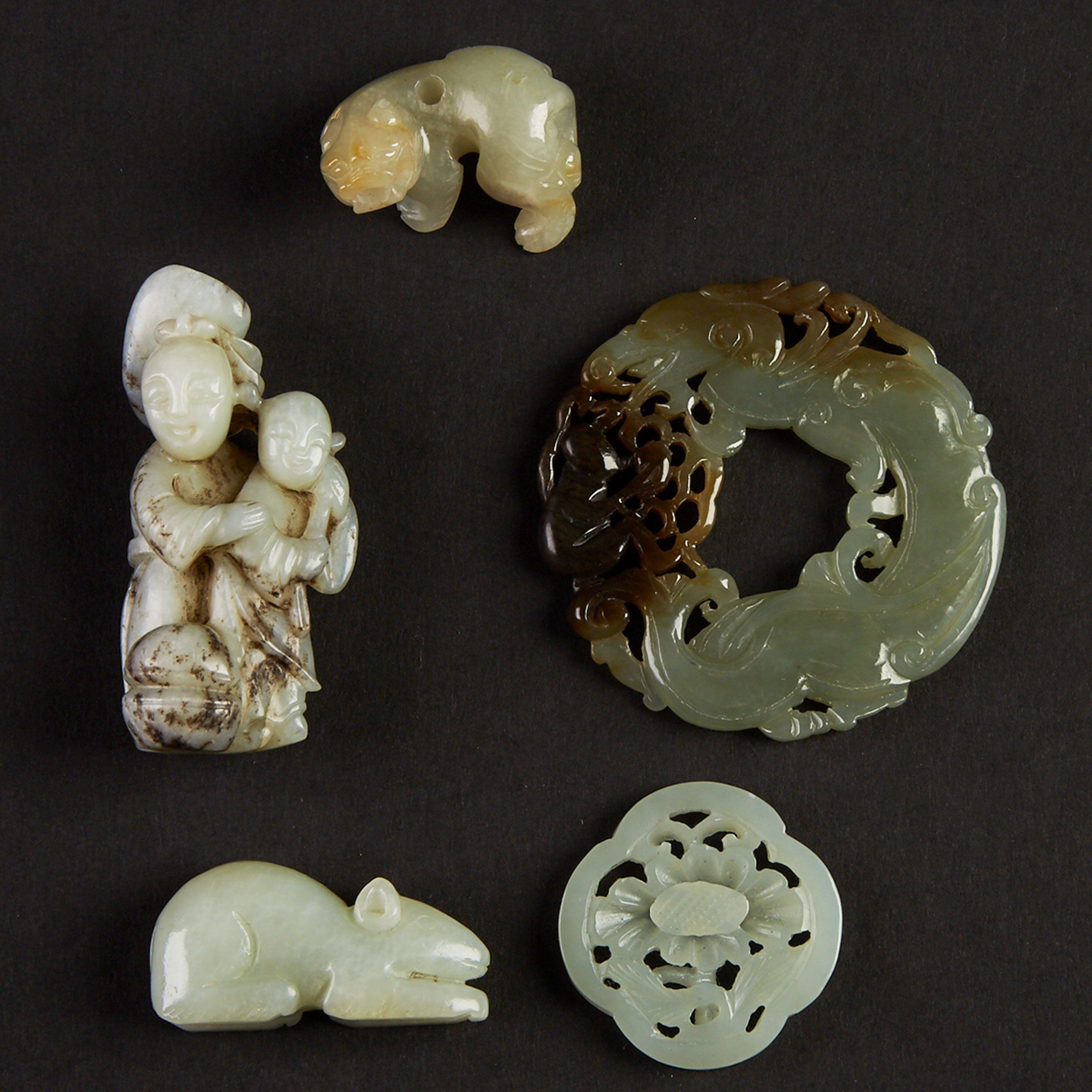 A Group of Five Celadon Jade Carvings