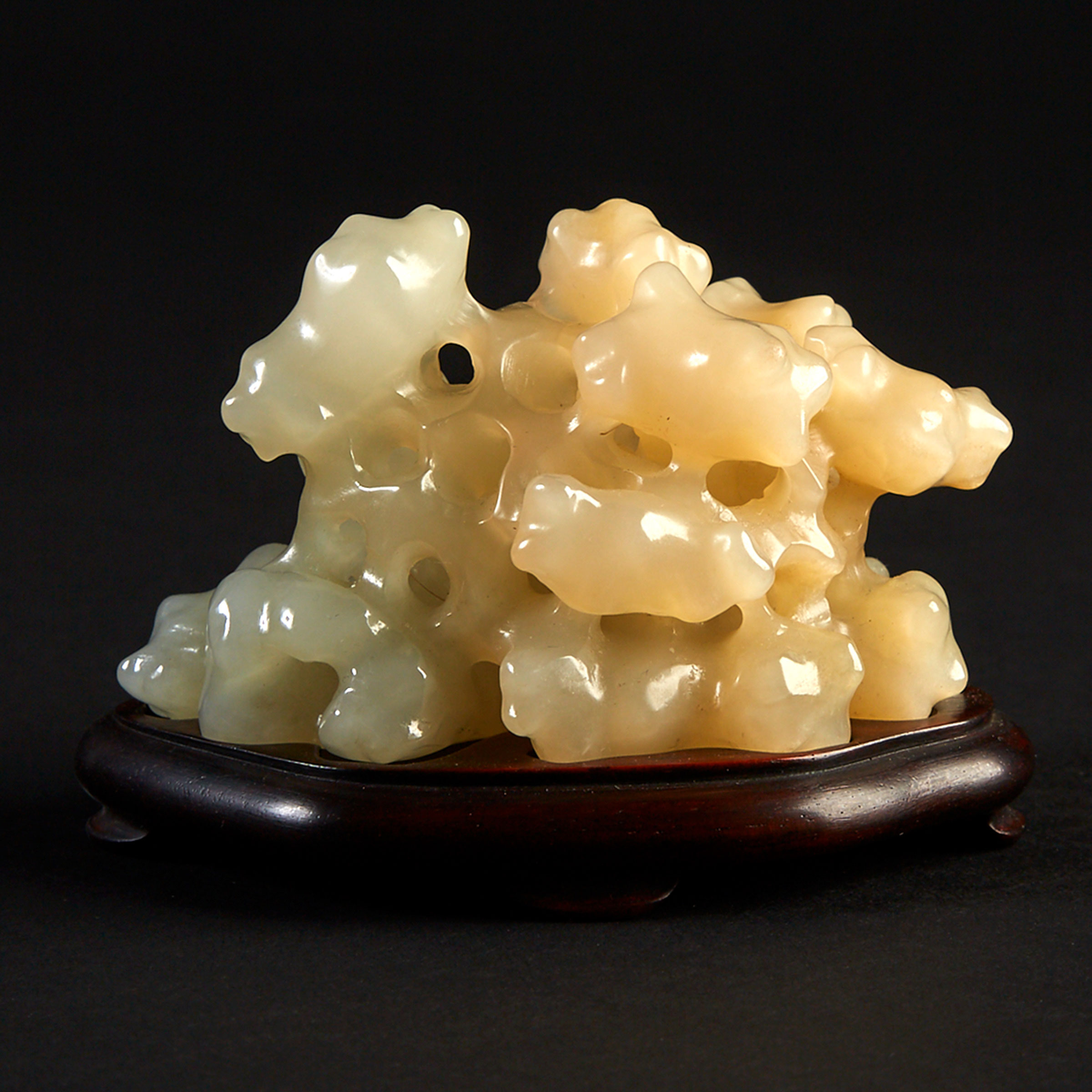 A Reticulated White Jade Carving