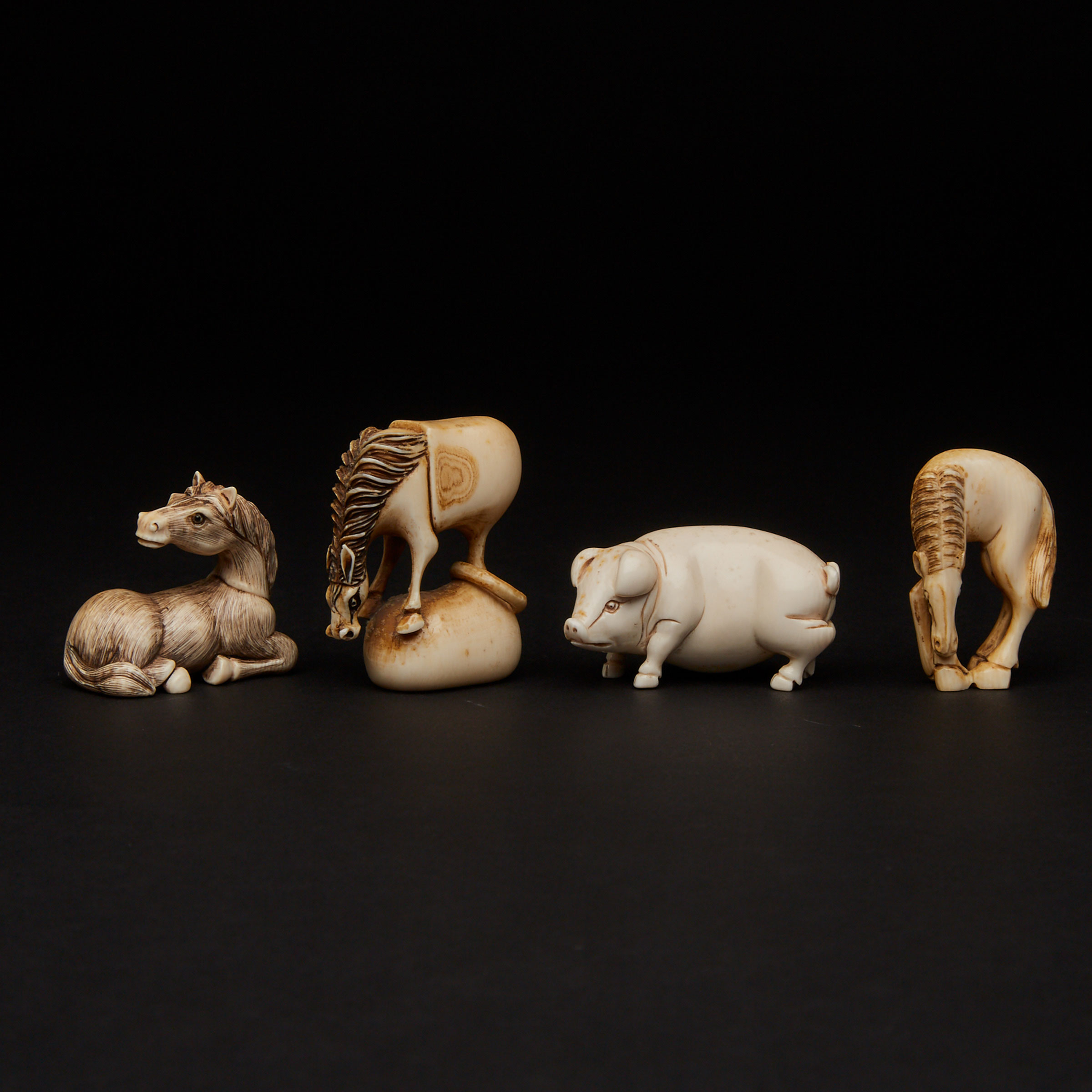 A Group of Four Ivory Carved Animal Netsuke