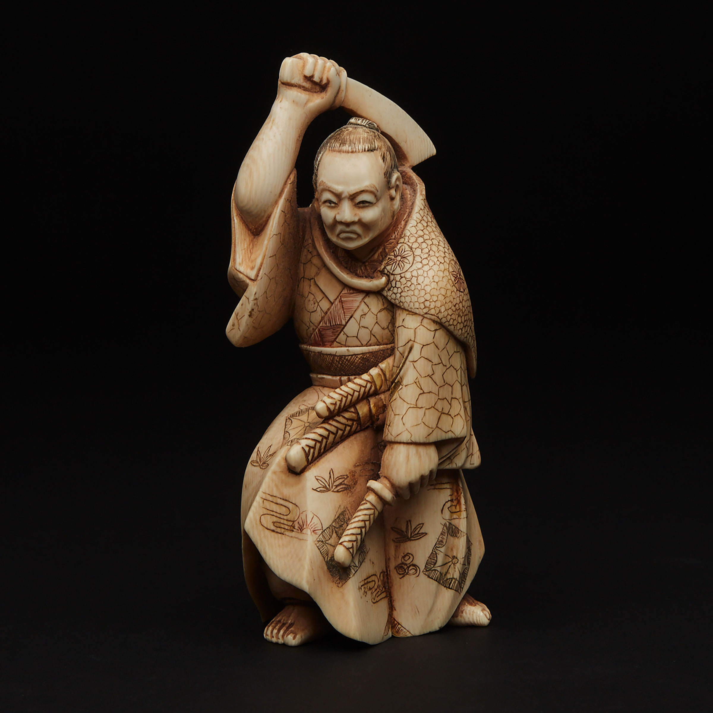 An Ivory Okimono of a Samurai