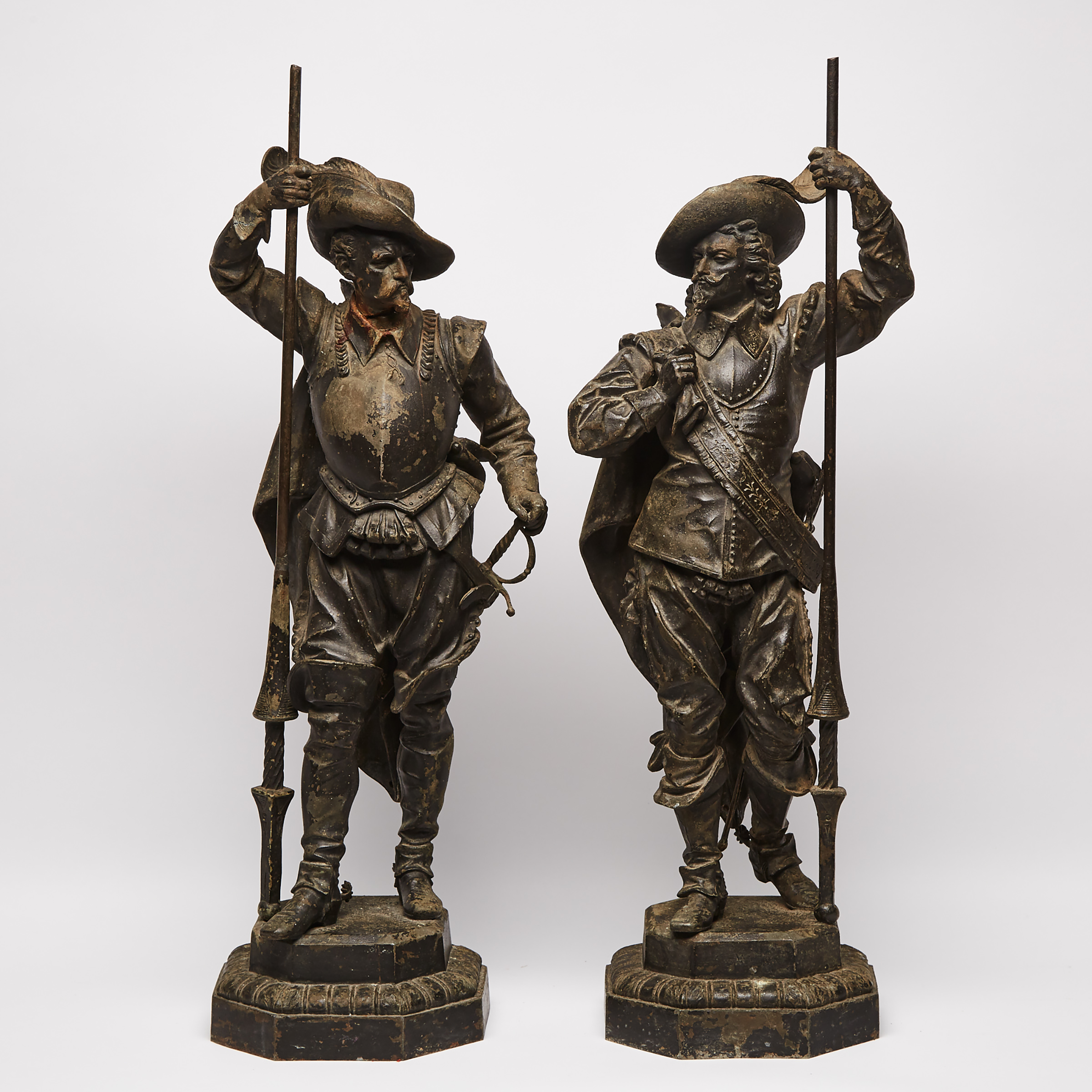 Pair of Victorian Patinated White Metal Figures of Cavaliers, 19th century