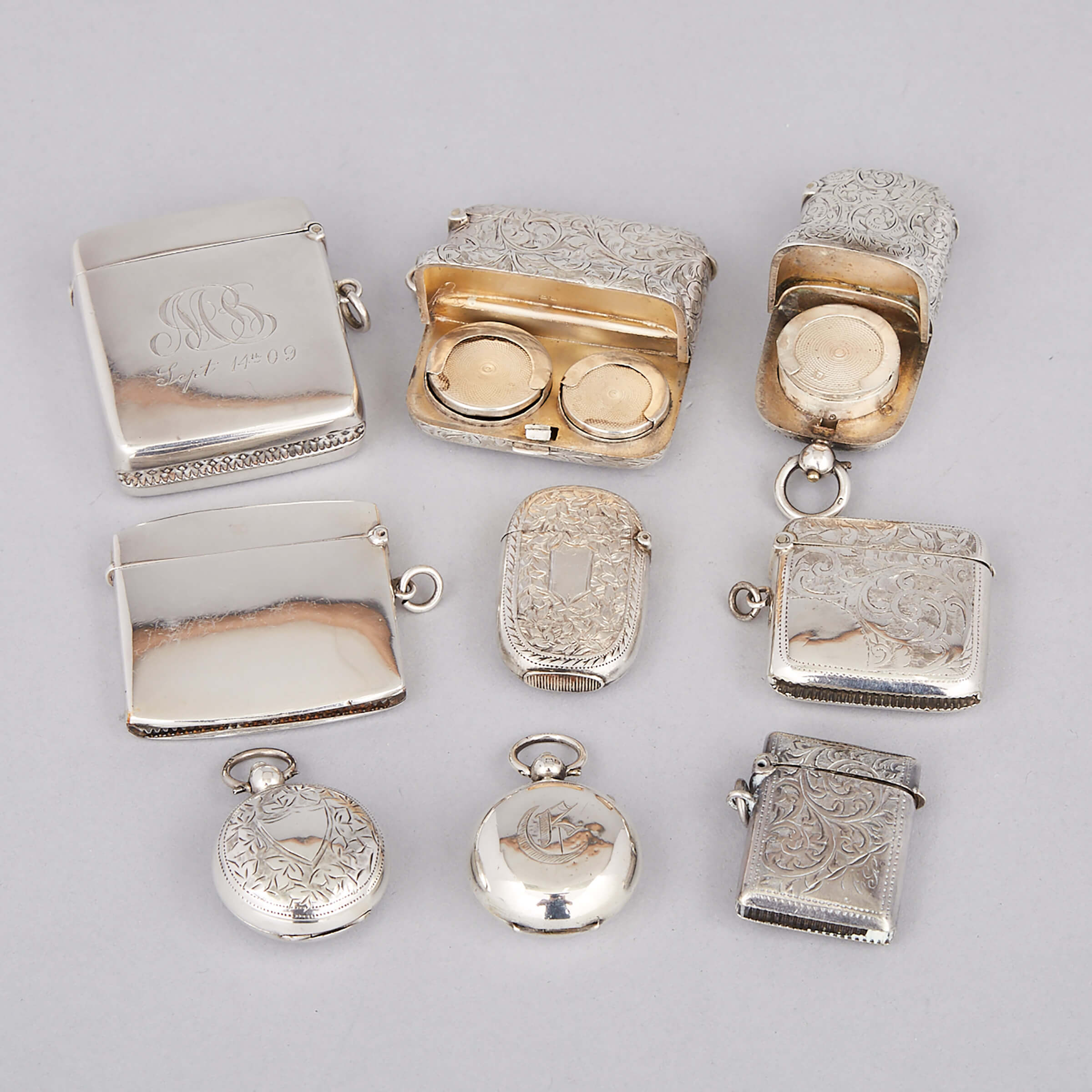 Nine Victorian and Edwardian Silver Vesta and Sovereign Cases, c.1884-1915