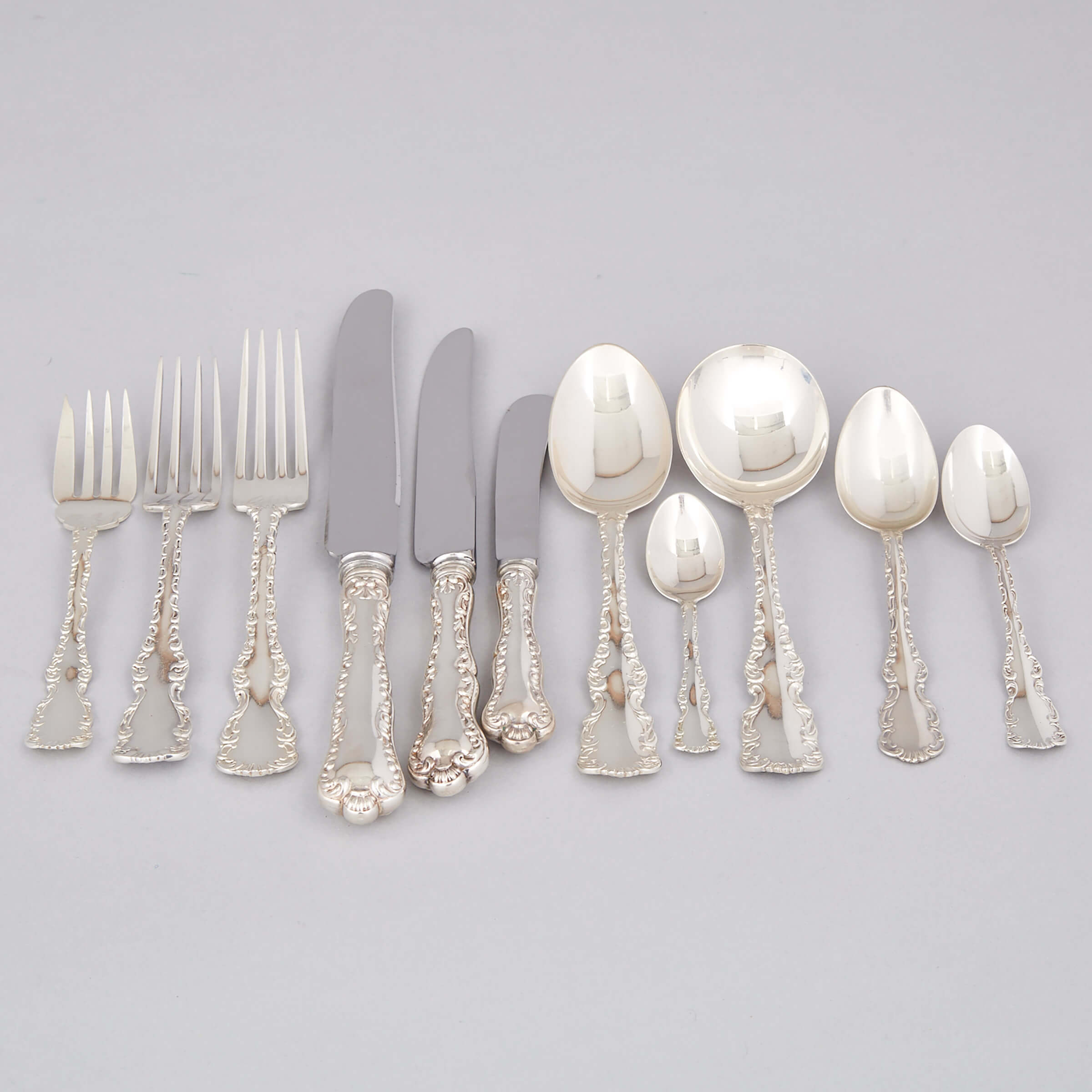 Assembled Canadian and American Silver ‘Louis XV’ Pattern Flatware Service, Henry Birks & Sons, Roden Brothers and Whiting Mfg. Co., 20th century