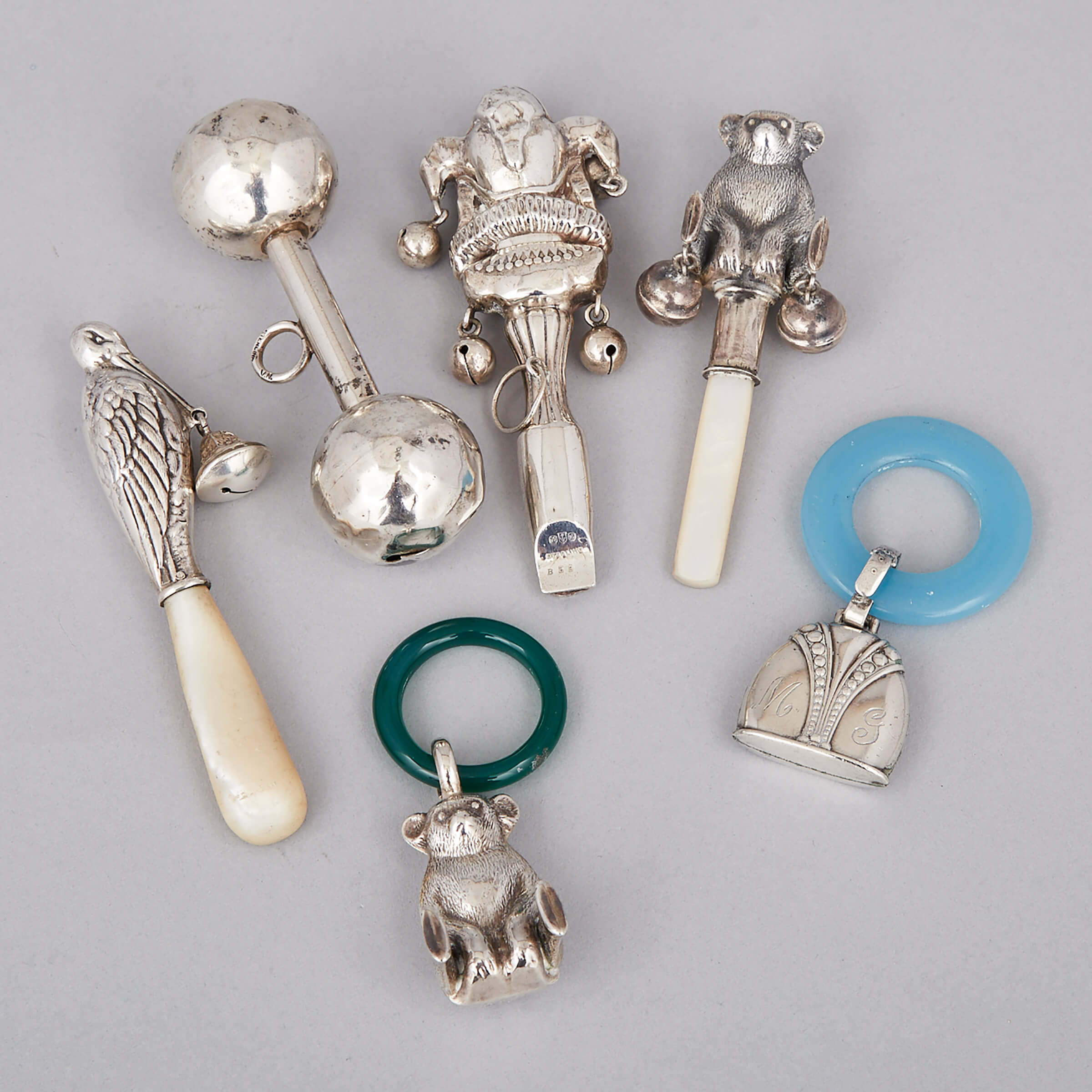 Six Mainly North American Silver Child’s Rattles and Whistles, late 19th/20th century