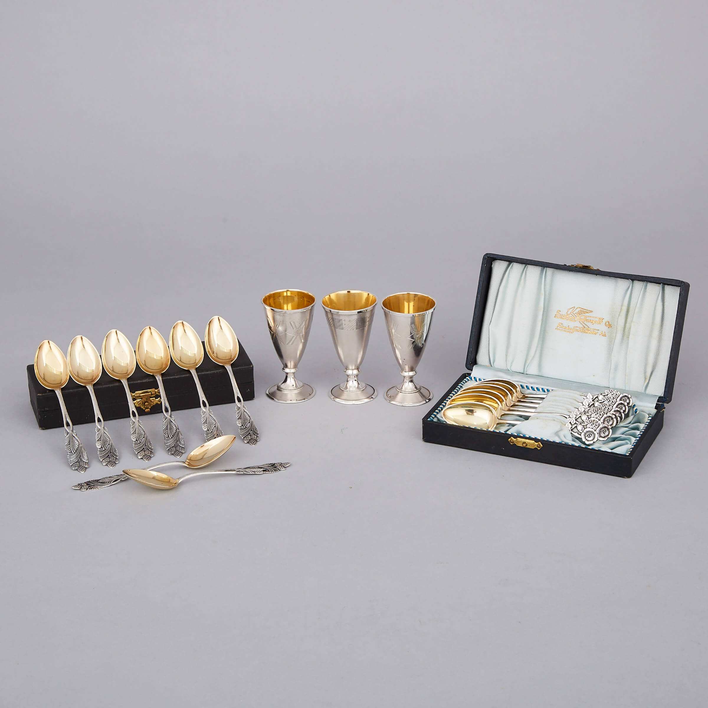 Three Russian Silver Vodka Cups and Fourteen Finnish Coffee Spoons, 20th century