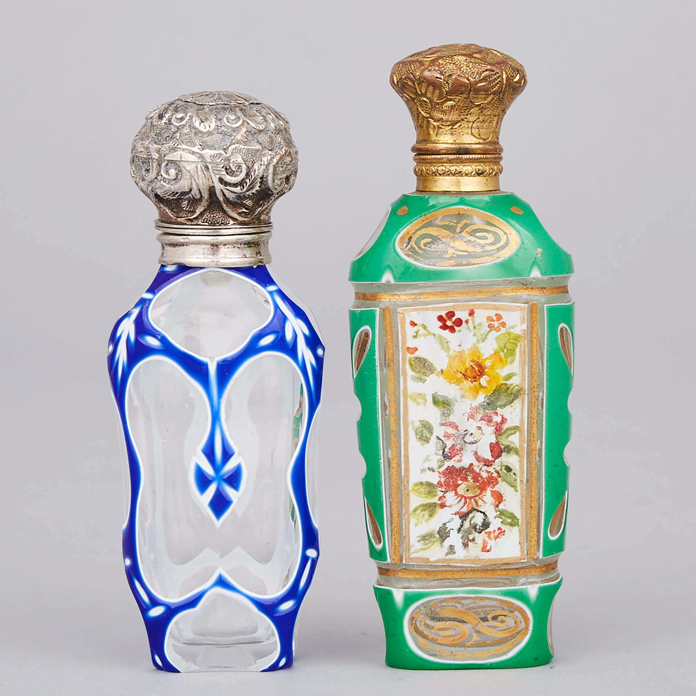 Two Silver or Metal Mounted Blue and Green Overlaid and Cut Glass Perfume Bottles, late 19th century
