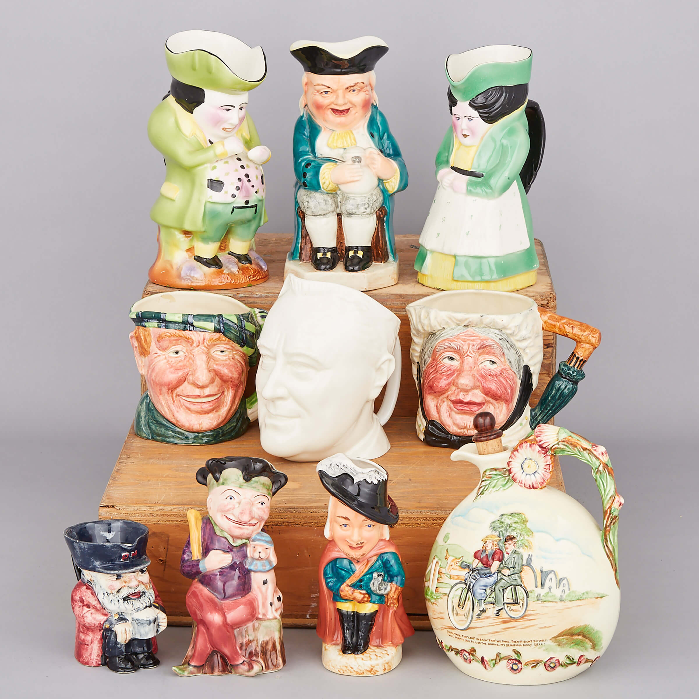 Crown Devon ‘Daisy Bell’ Musical Decanter and Nine Various English Toby and Character Jugs, 20th century