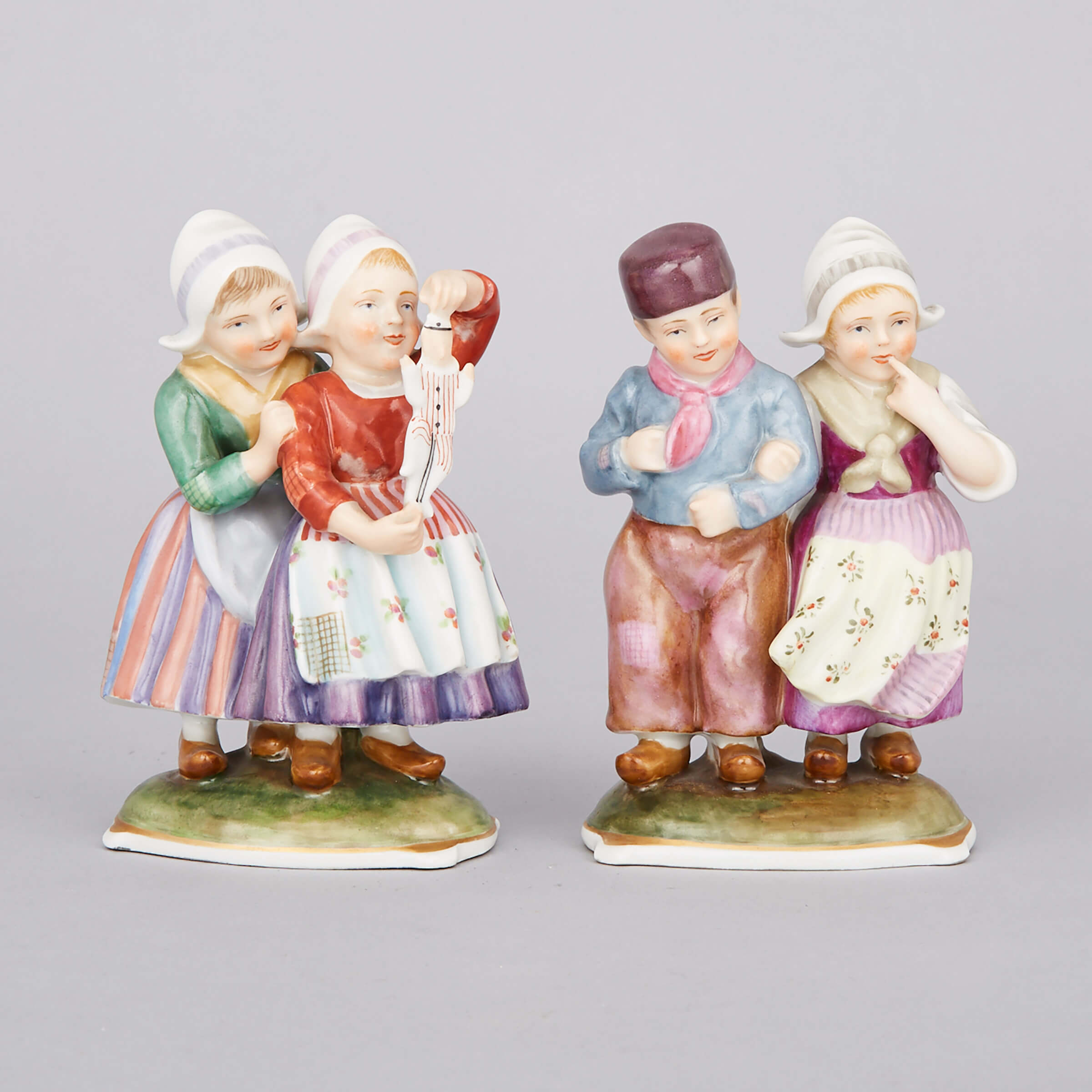 Pair of Ginori Figure Groups of Dutch Children, 20th century
