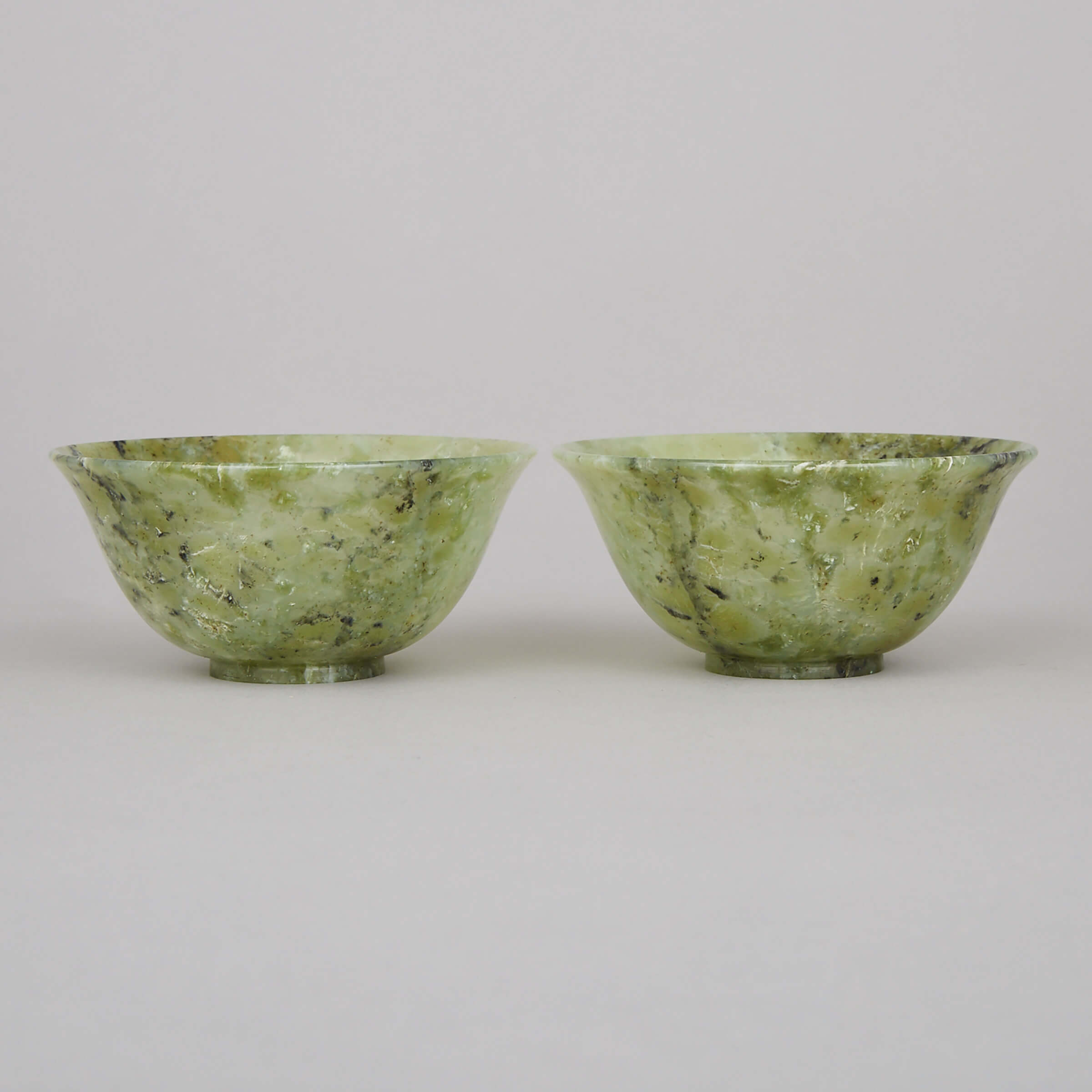 A Pair of Green Hardstone Bowls