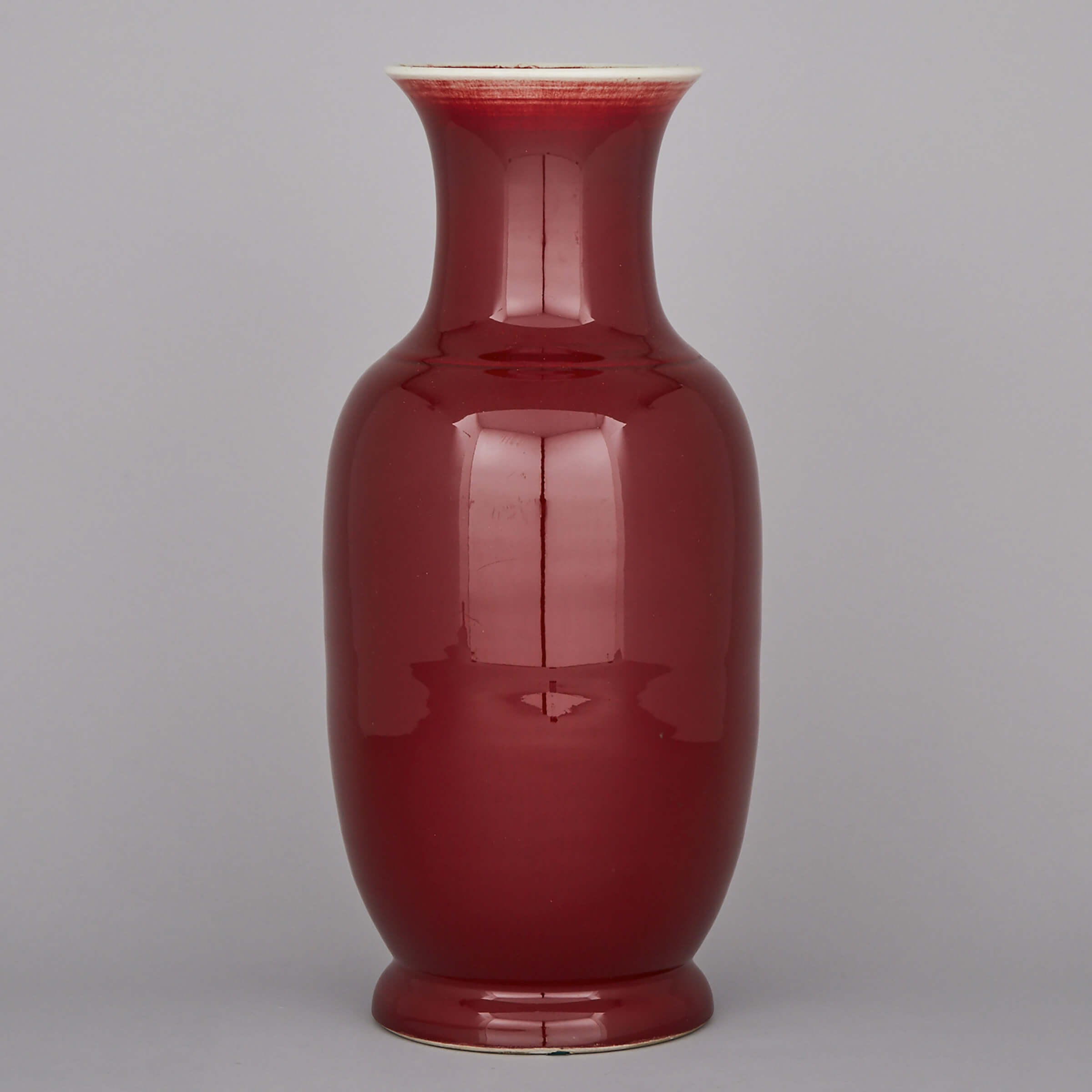 A Red Glazed Baluster Vase