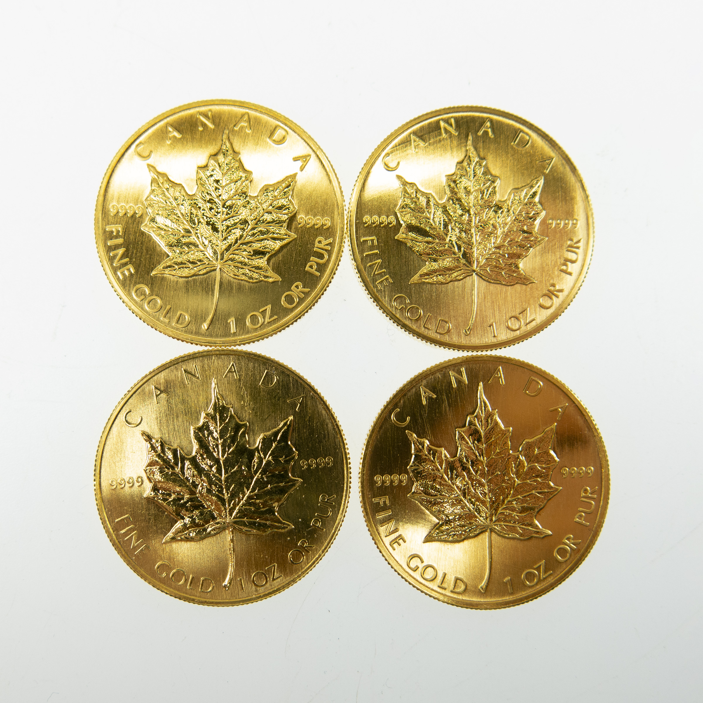 Four Canadian One Ounce Gold Maple Leaf Coins