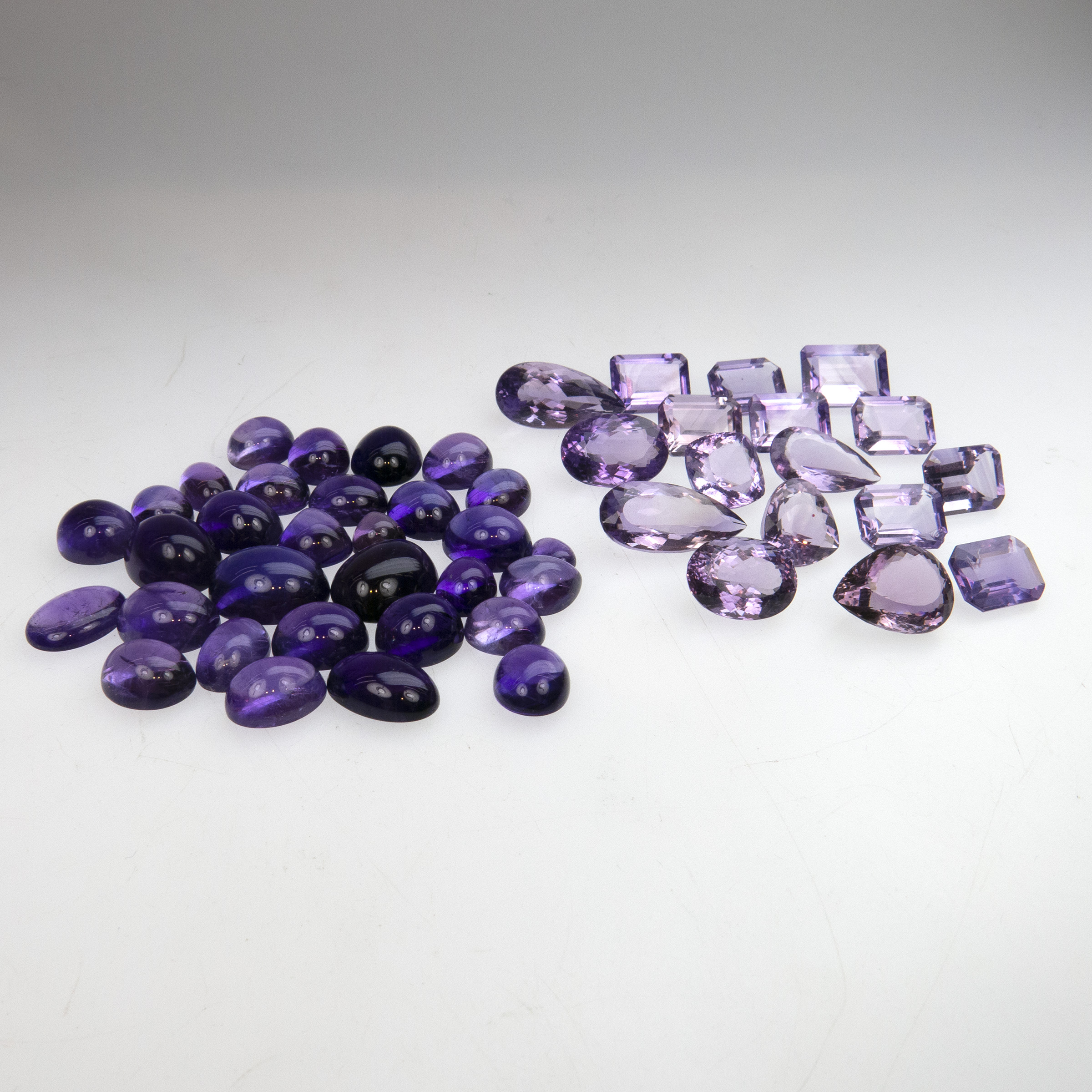 Quantity Of Unmounted Cut And Cabochon Amethysts