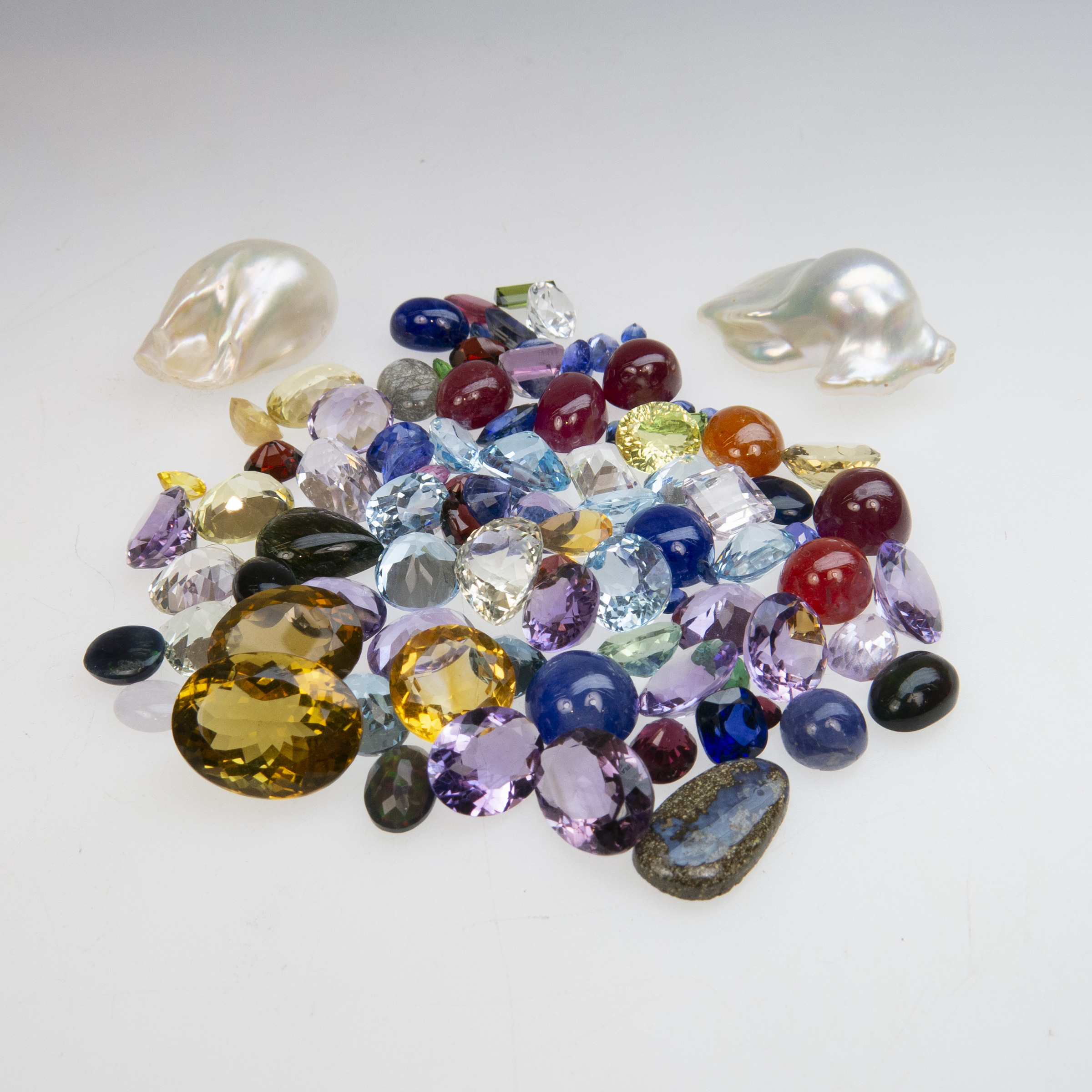 Two Large Baroque Pearls And A Quantity Of Various Unmounted Gemstones