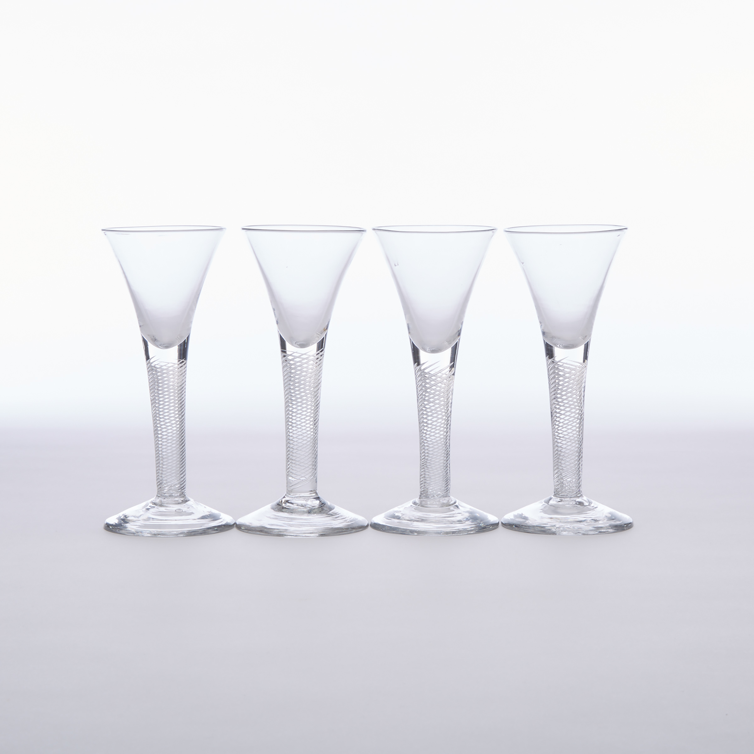 Set of Four English Air Twist Stemmed Wine Glasses, mid-18th century