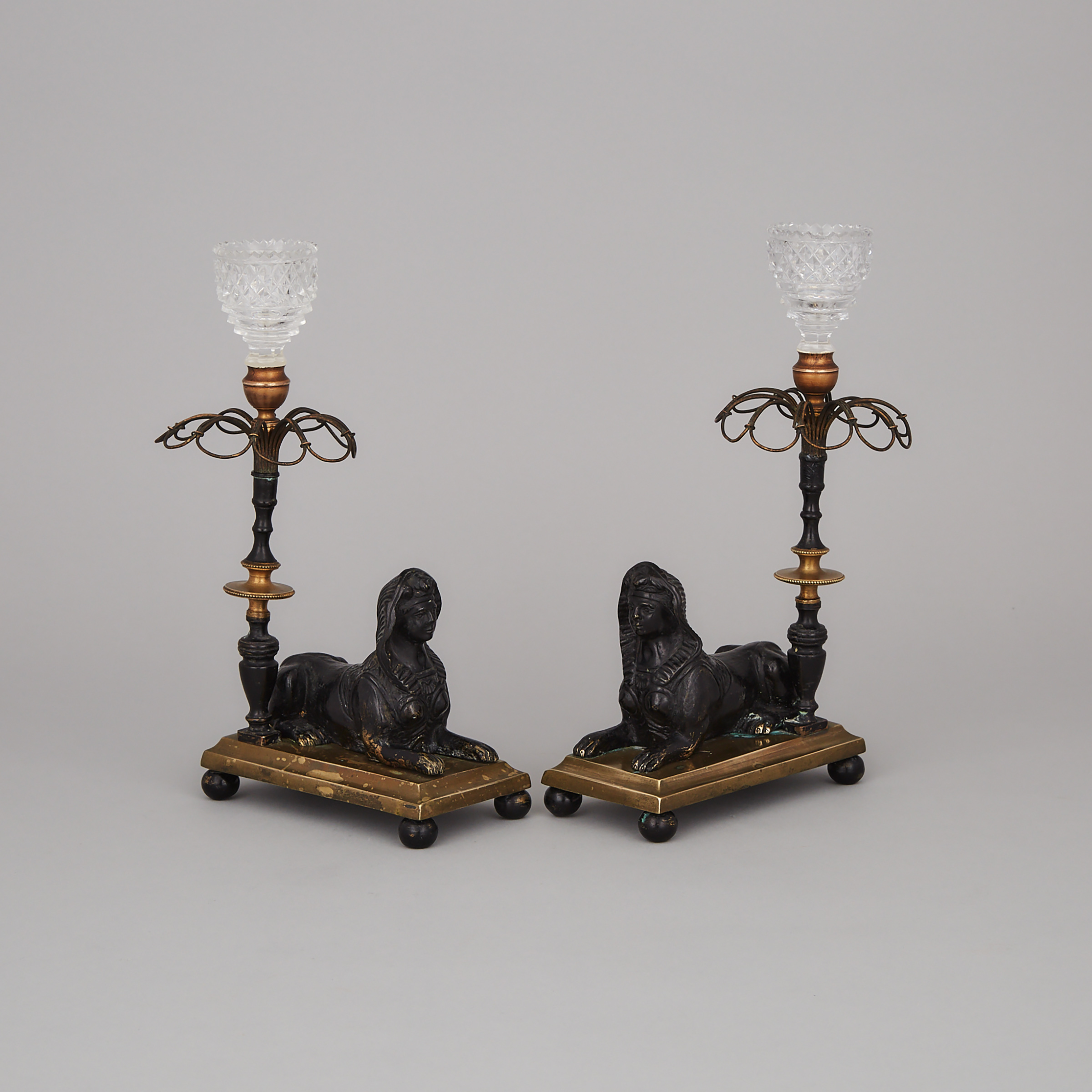 Pair of Regency Egyptian Revival Candle Sticks, early 19th century